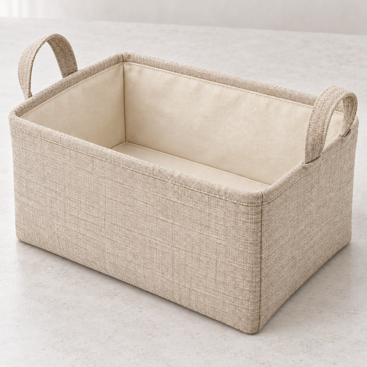 Natural Oat Small Rectangular Fabric Storage Basket showing fabric handles and open interior
