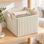 Sage Stripe Medium Square Fabric Storage Basket in a home storage setting