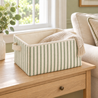 Sage Stripe Large Rectangular Fabric Storage Basket in a home storage setting