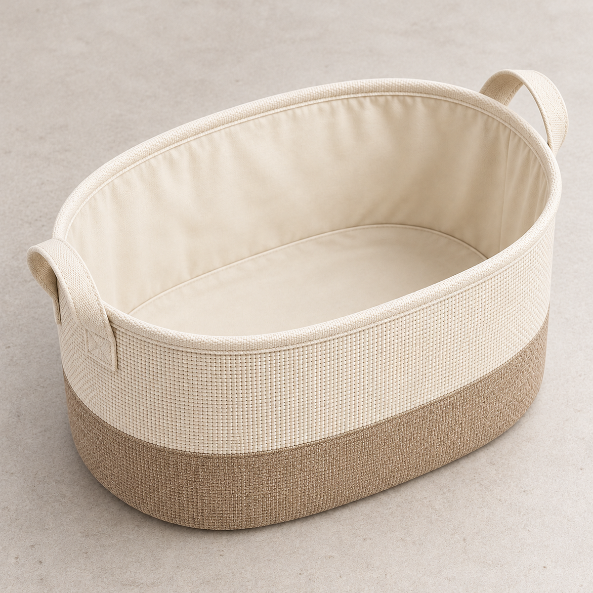 Soft Sand Wide Oval Fabric Storage Basket showing fabric handles and open interior